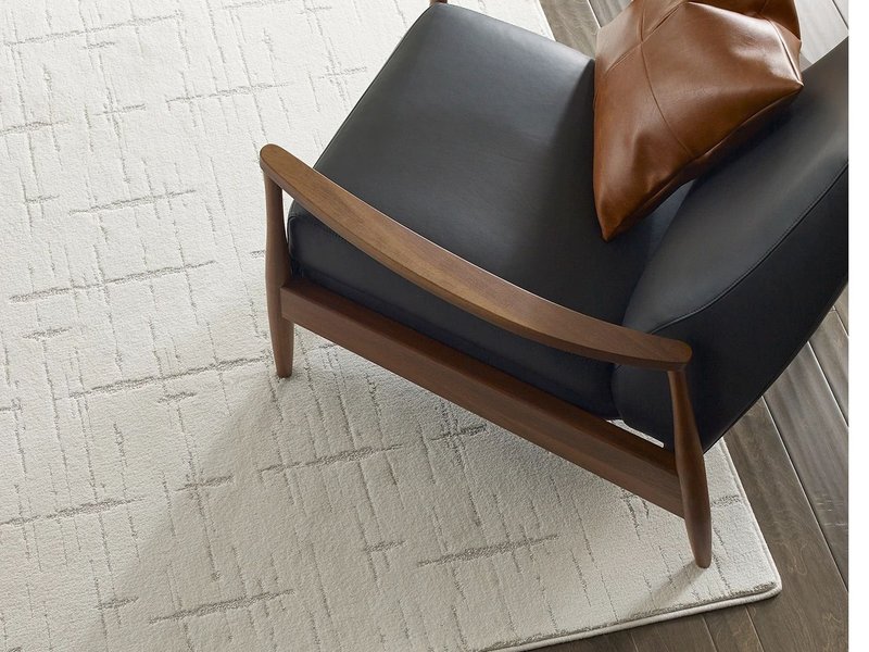 chair on rug from Pritchett's Flooring Design Center in the Colonial Heights, VA area