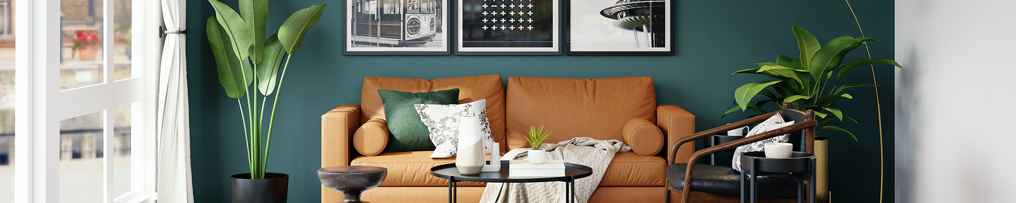 living room with orange couch and houseplants with pictures on the wall from Pritchett's Flooring Design Center in the Colonial Heights, VA area