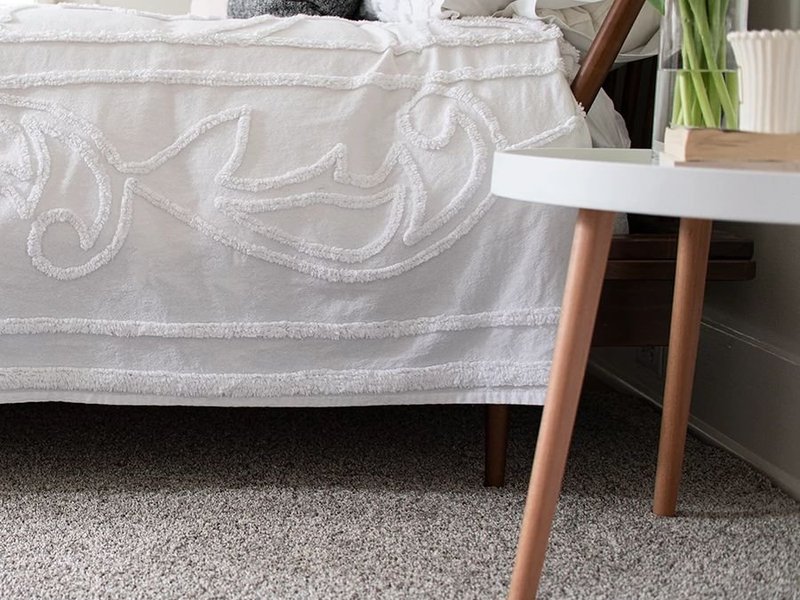 bedroom with gray carpet from Pritchett's Flooring Design Center in the Colonial Heights, VA area