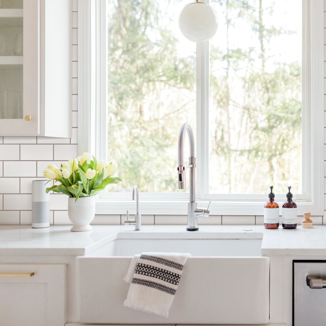 Bright kitchen with stone countertops from Pritchett's Flooring Design Center in the Colonial Heights, VA area