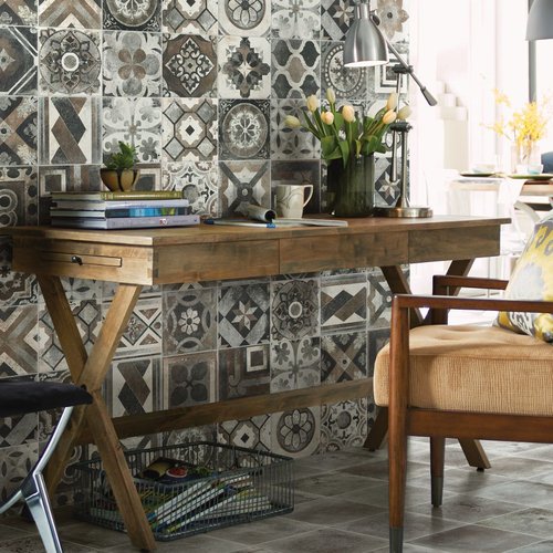 table and chairs against tiled wall from Pritchett's Flooring Design Center in the Colonial Heights, VA area